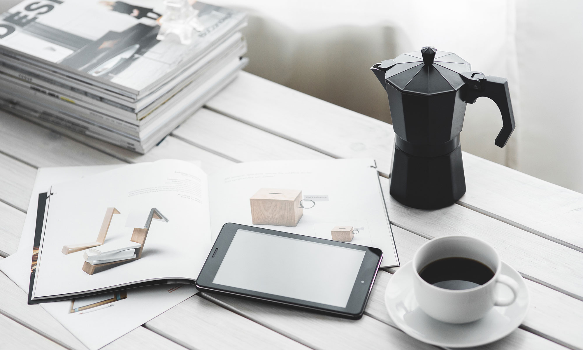 Branding: Coffee, books, and tablet